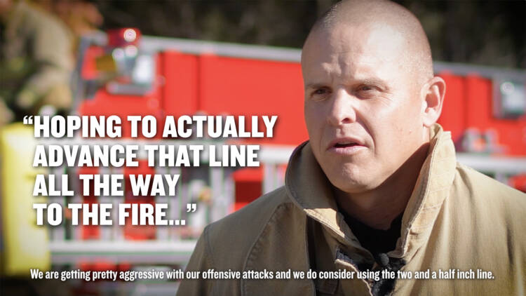 A firefighter in uniform without his helmet being interviewed with the quote "Hoping to actually advance that line all the way to the fire" over top.